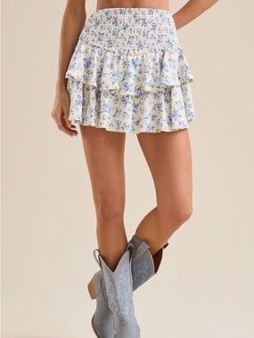 ARULA (Altar’d State) White Mini Skirt with Blue Floral Print